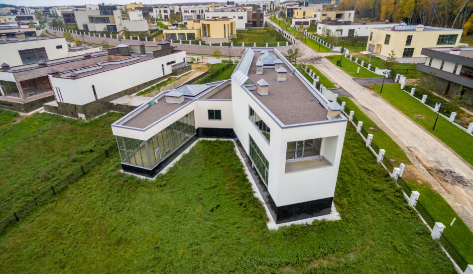 Modern country houses under construction as seen from air