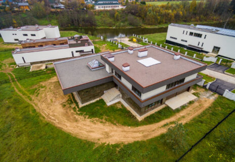 Modern country houses under construction as seen from air