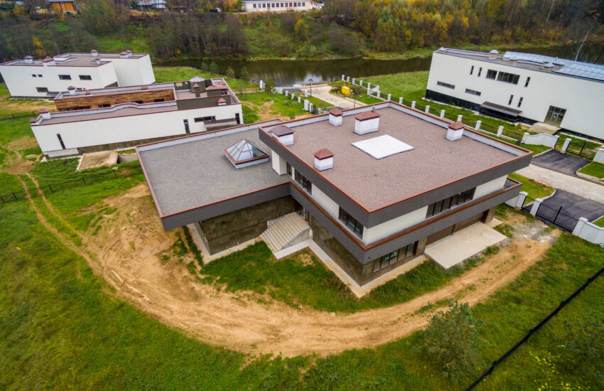 Modern country houses under construction as seen from air